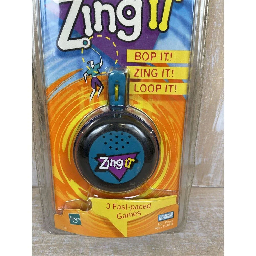 Vintage Hasbro Zing It Handheld Electronic Talking Musical Game 1999 *NEW